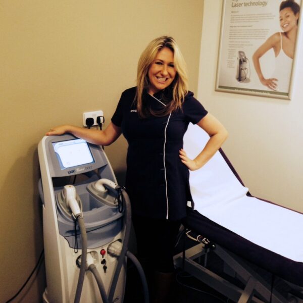 Laser hair removal and skin treatmen- Siobhan the team professional Siobhan posing with the machine