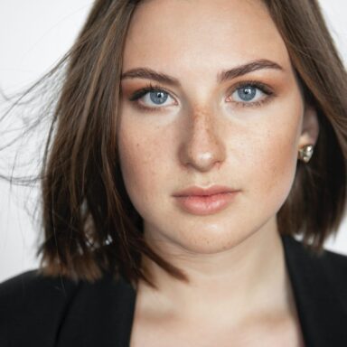 confident woman with blue eyes