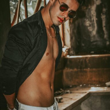 male flaunting his body