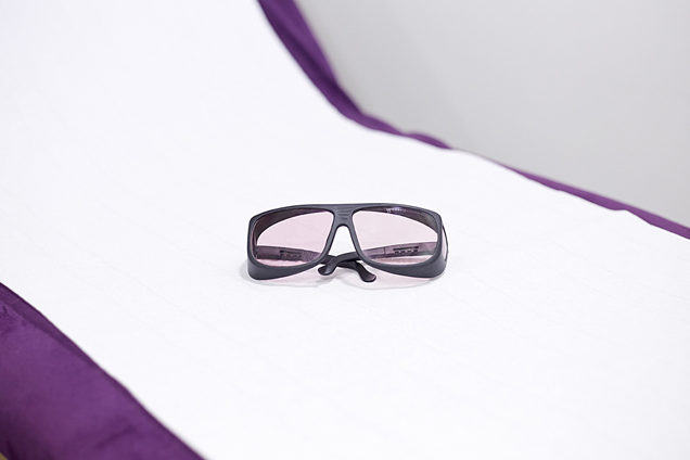 laser glasses on treatment bed