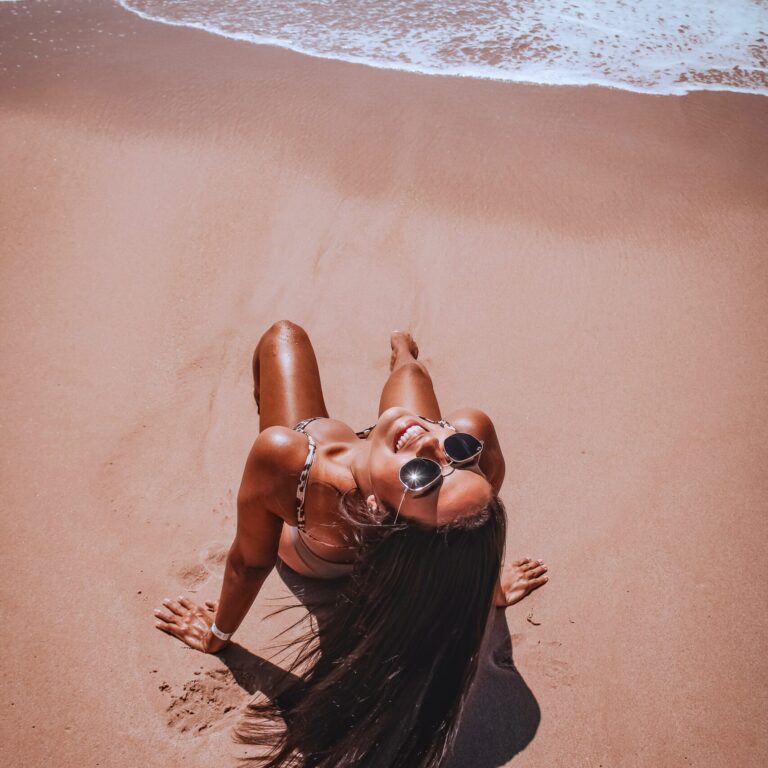 woman at beachside-sun protection, moisturizer