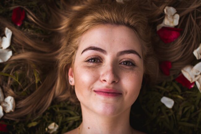 pexels-daniel-xavier-839633 happy women with petals all around